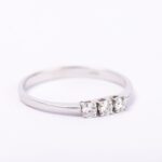 Anello Trilogy in Oro Bianco con Diamanti - TR15LTG24M